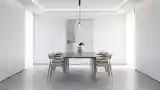 Minimalist Dining Room with Wood and Concrete