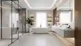 Lakoniczna łazienka z betonem