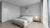 Minimalist Bedroom with Concrete Walls