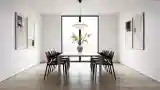 Minimalist Dining Room with Wood and Black Chairs
