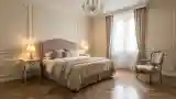 Sunlit Bedroom with Wood and Crystal