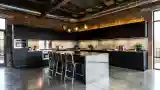 Industrial Kitchen with Brick and Steel