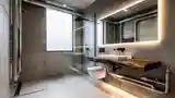 Industrial Bathroom with Raw Elegance