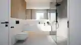 Spacious Bathroom with Wood Accents